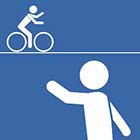 Pedestrian and bicyclist waving at each other