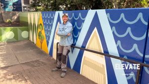 Liberty Plaza mural and artist Christian Stanley